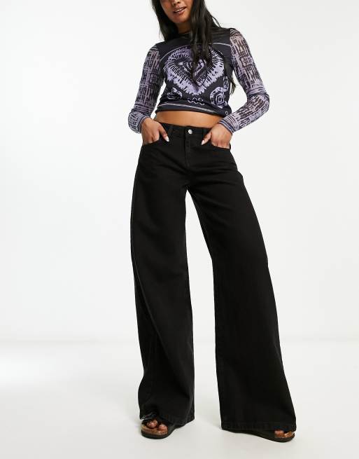 Reclaimed Vintage - 88' - Jeans met wijde pijpen in zwart met wassing