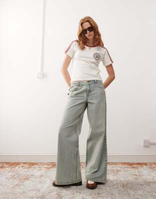 Reclaimed Vintage 88' wide leg low rise jean in 90s bleach wash-Blue φωτογραφία