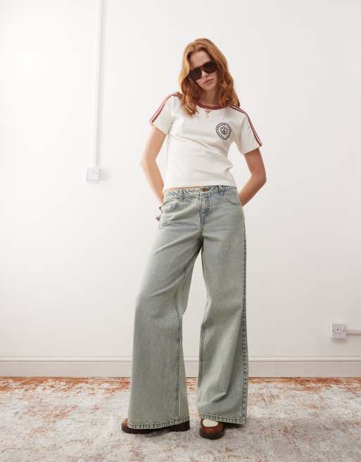 Reclaimed Vintage 88 wide leg low rise jeans in 90s bleach wash ASOS