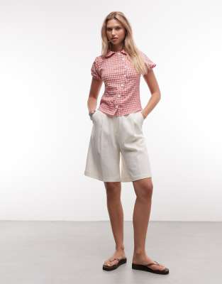 Reclaimed Vintage asymmetric placket fitted shirt in red and white check