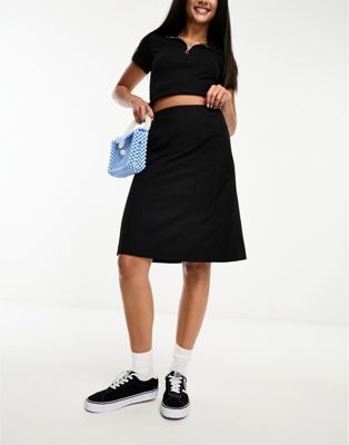 Reclaimed Vintage awkward length midi skirt in black pinstripe