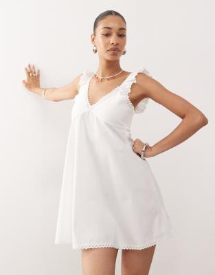 Reclaimed Vintage Reclaimed Vintage babydoll poplin cami mini dress with broderie and lace trims in cream-White