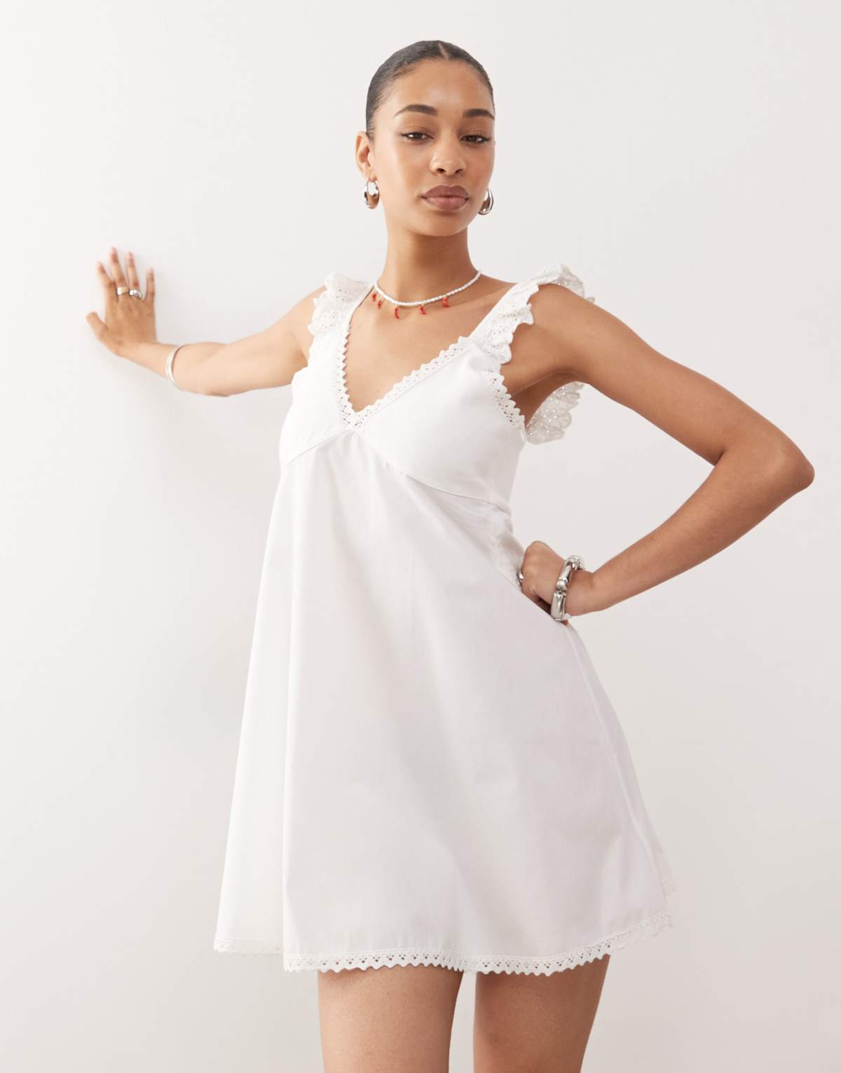 Reclaimed Vintage babydoll poplin cami mini dress with broderie and lace trims in cream
