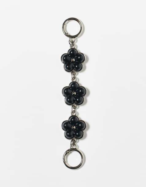 Reclaimed Vintage bag charm and key ring with black flowers in silver - view 1