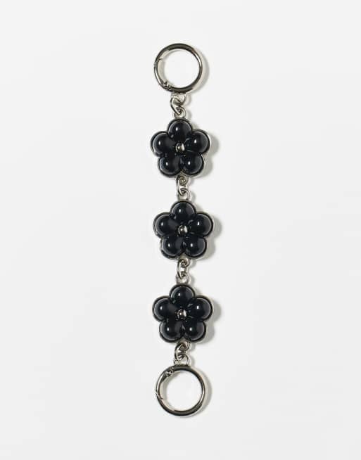 Reclaimed Vintage bag charm with black flowers