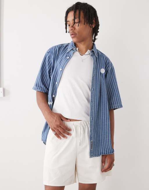 Reclaimed Vintage baggy fit shorter length pull on chino short in ecru