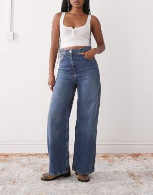 Reclaimed Vintage Reclaimed Vintage baggy jean in mid blue western wash