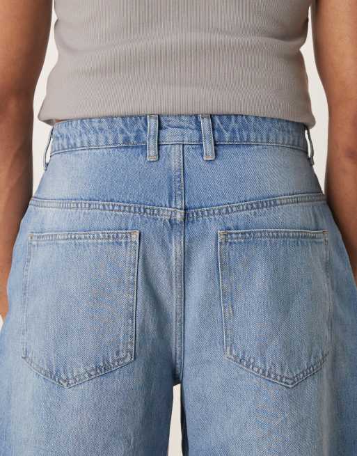 Reclaimed Vintage baggy wide leg denim jeans in bleach wash