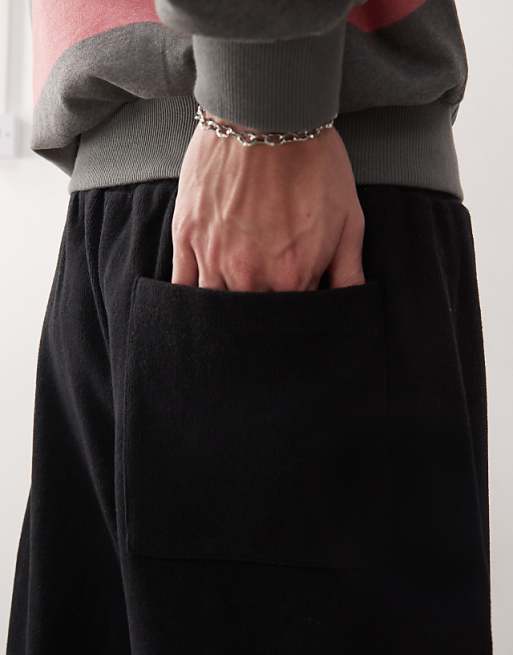 Reclaimed Vintage baggy wide leg jogger in black rib | ASOS Reclaimed Vintage baggy wide leg jogger in black rib | ASOS
