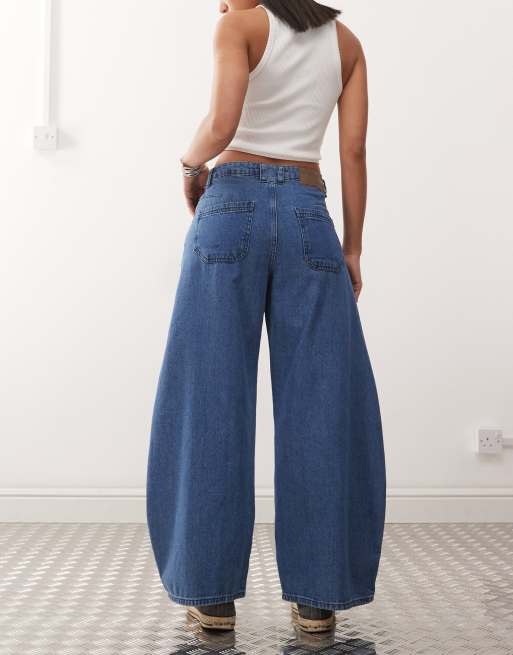 Reclaimed Vintage barrel leg denim jeans in mid blue wash