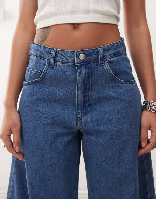 Reclaimed Vintage barrel leg denim jeans in mid blue wash
