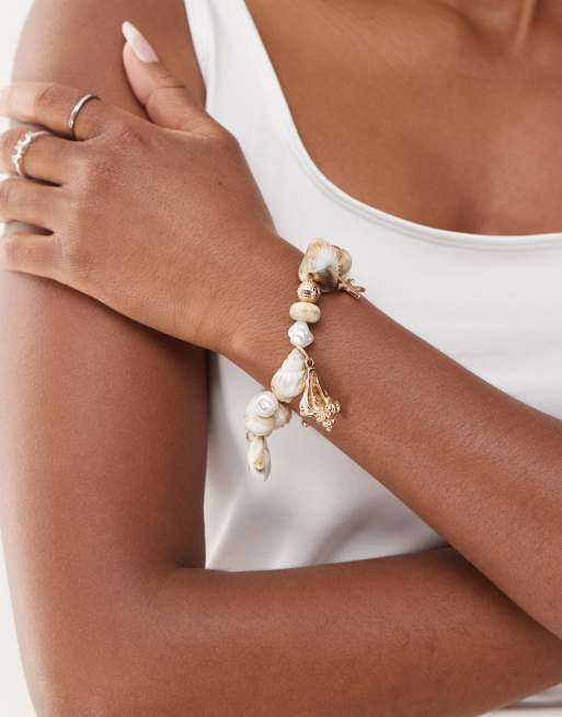 Reclaimed Vintage - Bedelarmband met gemengde imitatie schelpen