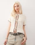 [Reclaimed Vintage] Reclaimed Vintage blanket stitch crochet tie front short sleeve cardigan in cream-White S Cream