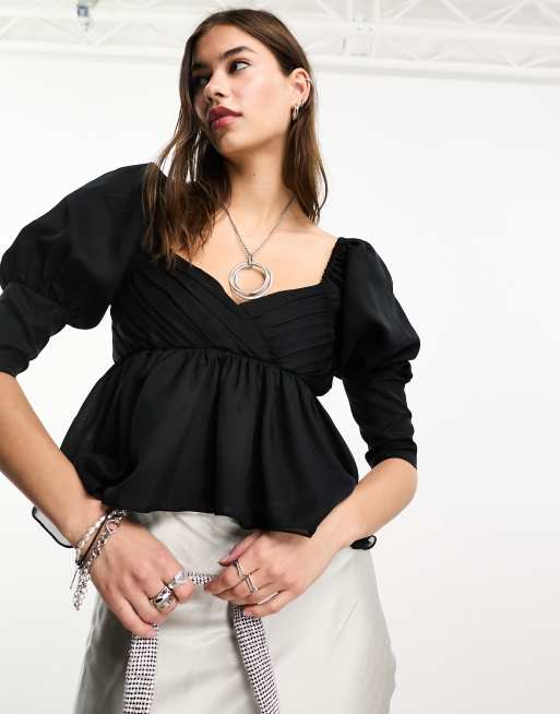 Reclaimed Vintage - Blusa con maniche a sbuffo e orlo asimmetrico