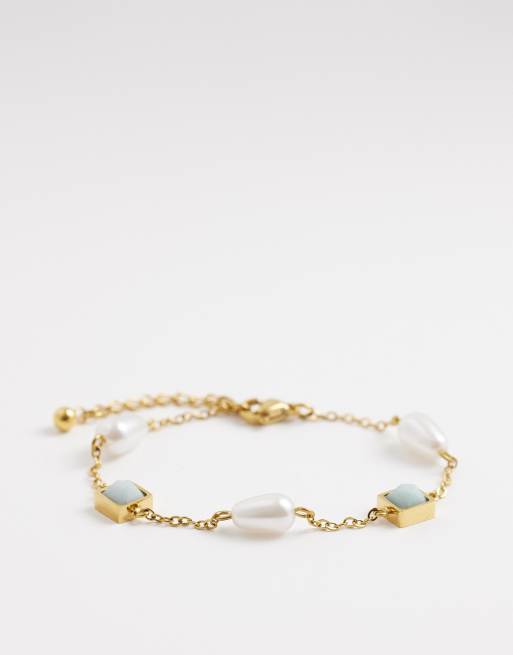 Reclaimed Vintage - Bracciale in acciaio inossidabile con pietra blu e perla a goccia