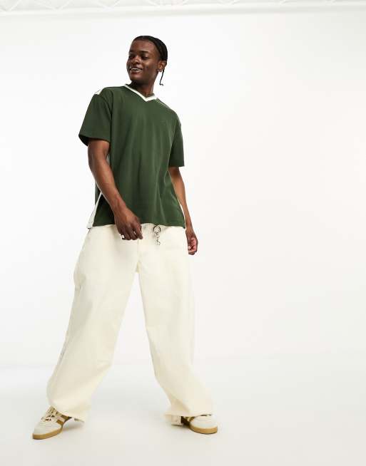 Reclaimed Vintage branded v neck t shirt in green ASOS