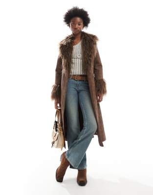 Reclaimed Vintage brown longline leather look mac with faux fur collar