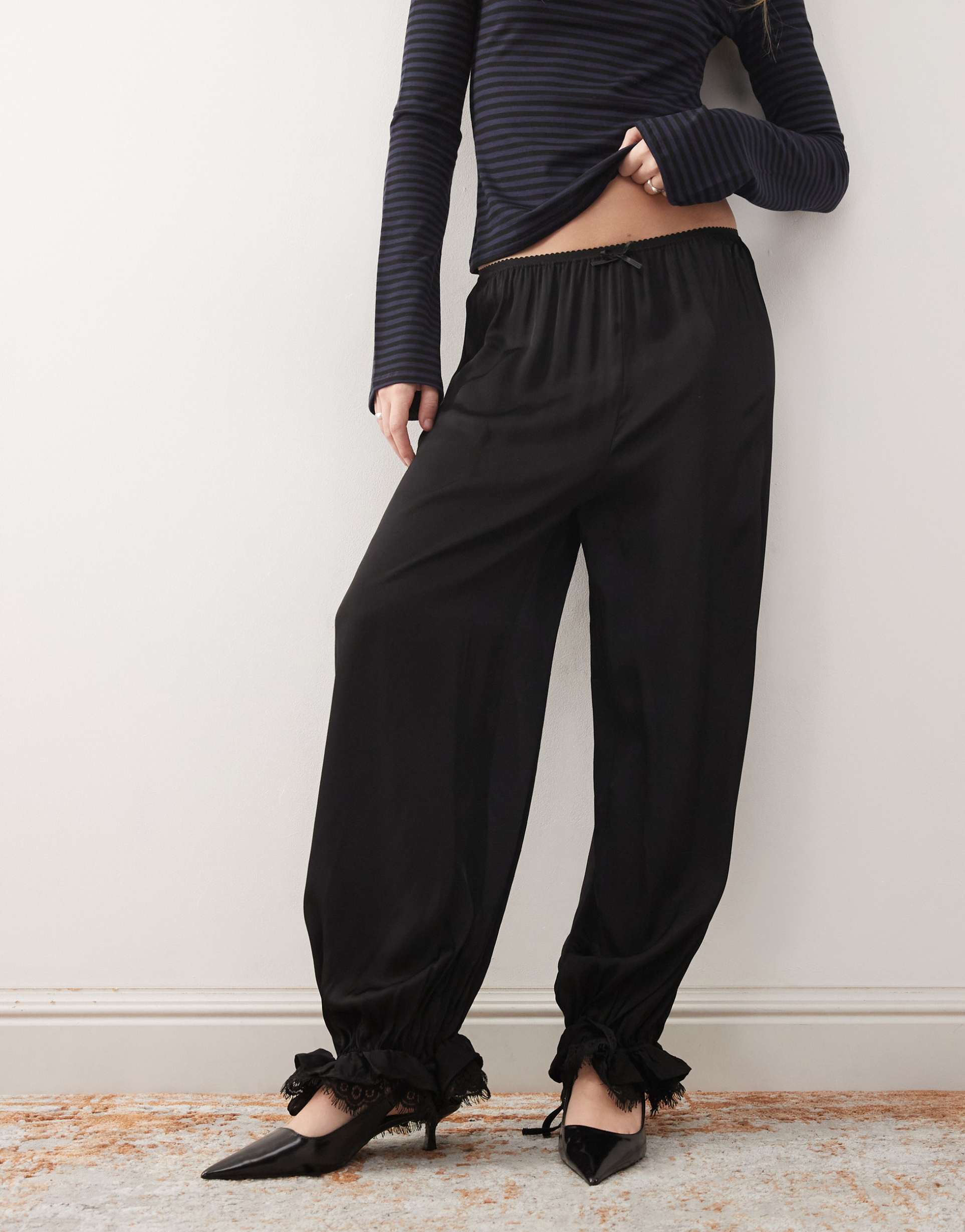 reclaimed vintage bubble hem pants with lace trim in black