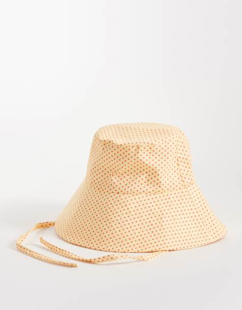 Reclaimed Vintage bucket hat with ties in yellow and red polka-dot print - view 1