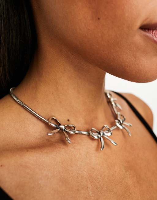 Reclaimed Vintage burnished silver necklace with bows ASOS
