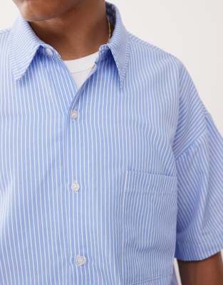 Reclaimed Vintage short sleeve boxy shirt in blue pinstripes