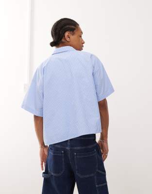 Reclaimed Vintage short sleeve boxy shirt in blue pinstripes