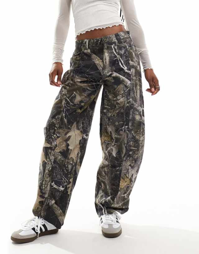 Reclaimed Vintage camo print barrel leg pants | ASOS