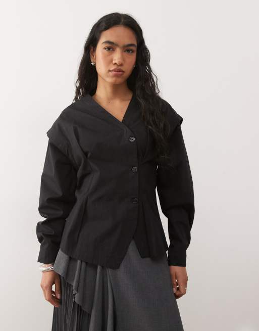 Reclaimed Vintage - Chemise boutonnée asymétrique à empiècements - Noir