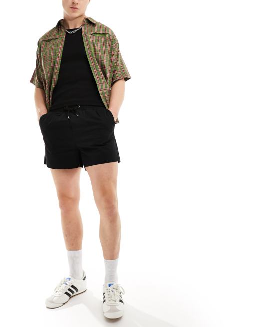 Reclaimed Vintage chino shorts in black