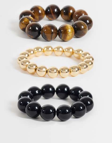 Reclaimed Vintage chunky three pack of bracelets in tigers eye, black and gold - view 1