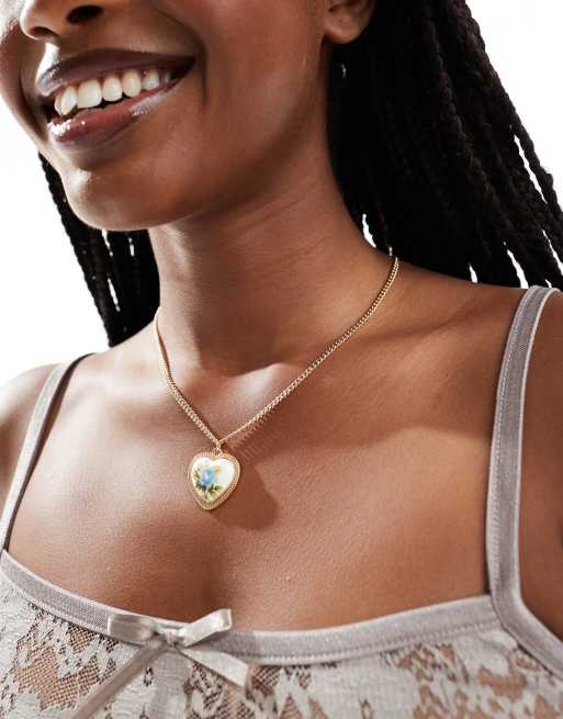 Reclaimed Vintage - Collier avec chaîne et pendentif fleur - Doré