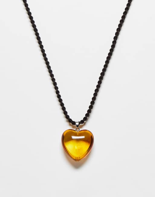 Reclaimed Vintage - Collier unisexe avec cœur en ambre sur cordon
