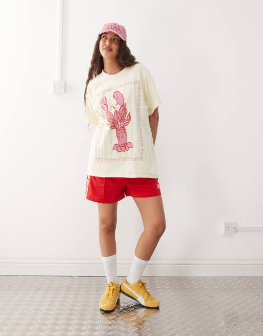 Reclaimed Vintage cotton oversized t-shirt with lobster print in washed yellow