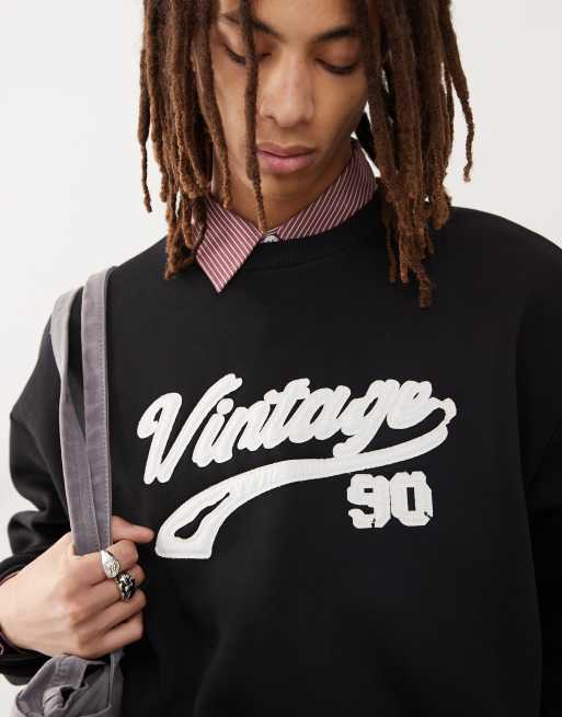 Reclaimed Vintage cropped boxy sweat with applique varsity logo in washed black