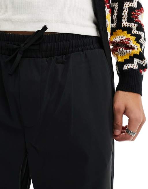 Reclaimed Vintage cropped slim leg pants in black
