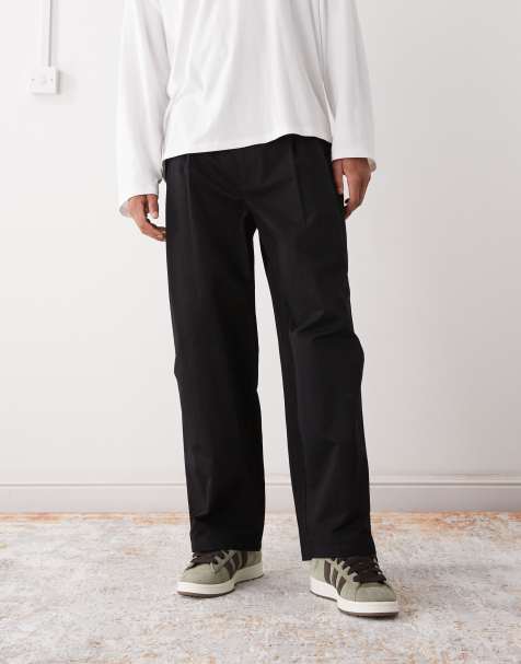 Reclaimed Vintage tailored wide leg trousers with double pleat detail in black