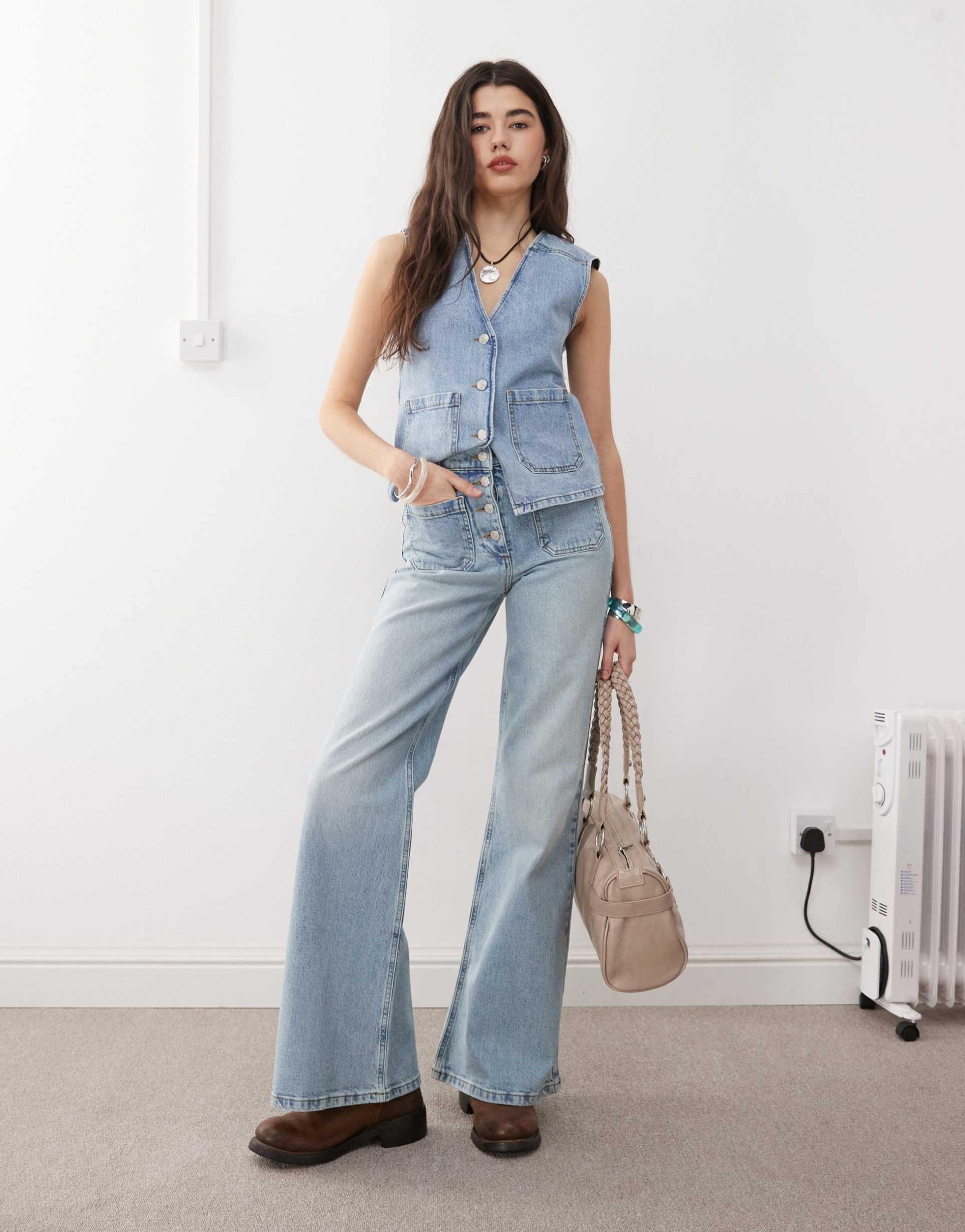 reclaimed vintage denim 70s palazzo jeans with patch pockets and button fly detail in blue wash