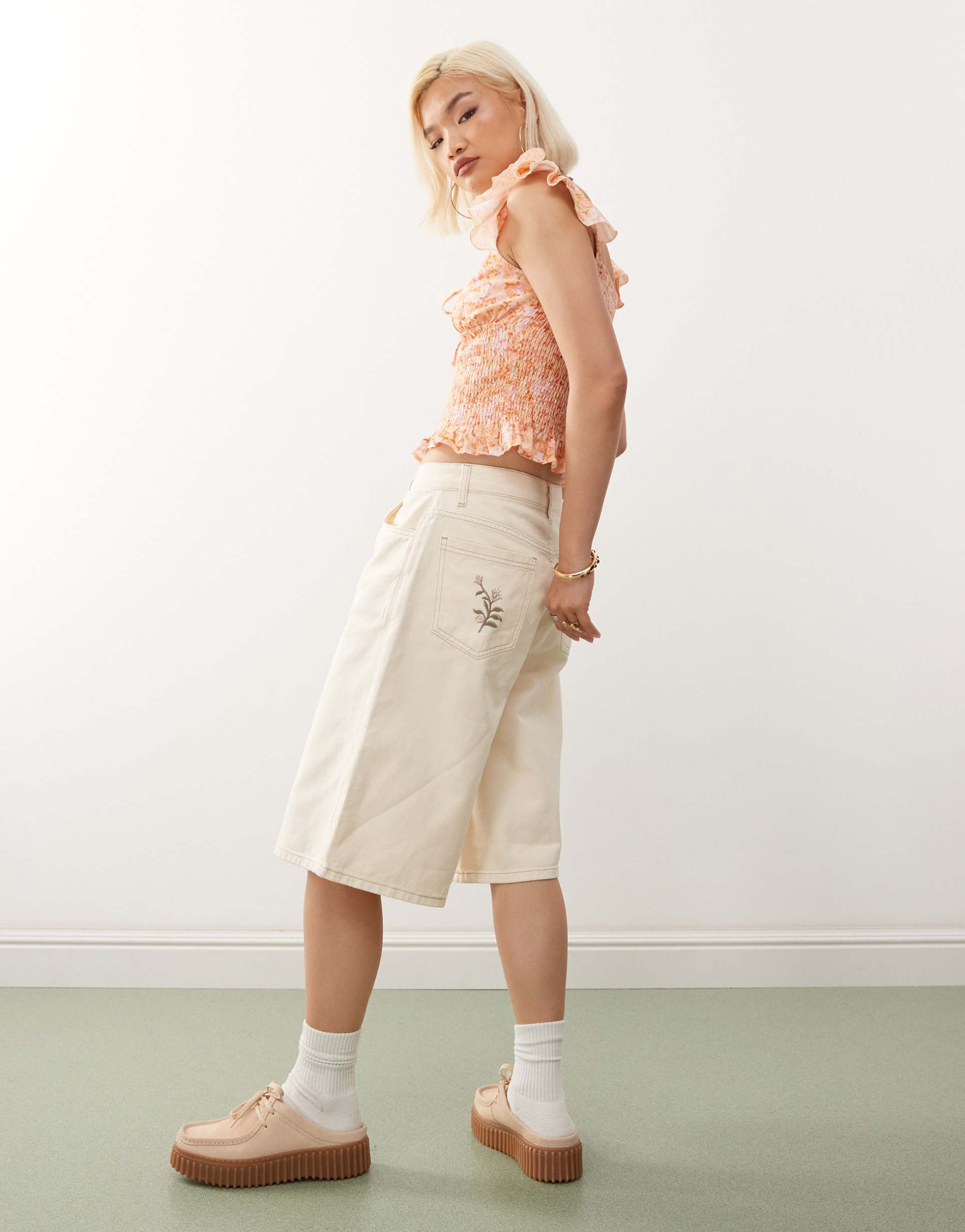 reclaimed vintage denim jorts with embroidery detail in buttermilk yellow