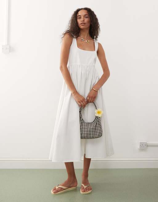 Reclaimed Vintage denim midi dress with seam details in buttermilk yellow