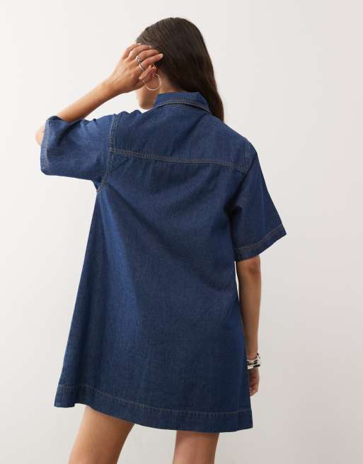 Reclaimed Vintage denim mini shirt dress in mid blue wash with tobacco stitch