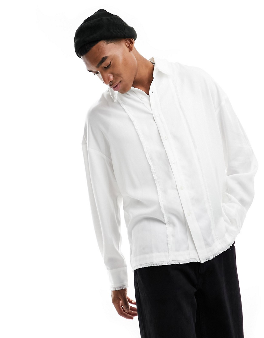 Reclaimed Vintage distressed long sleeve shirt in white with fraying detail