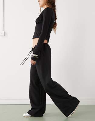 Reclaimed Vintage Drawstring Pull On Barrel Leg Pants In Black