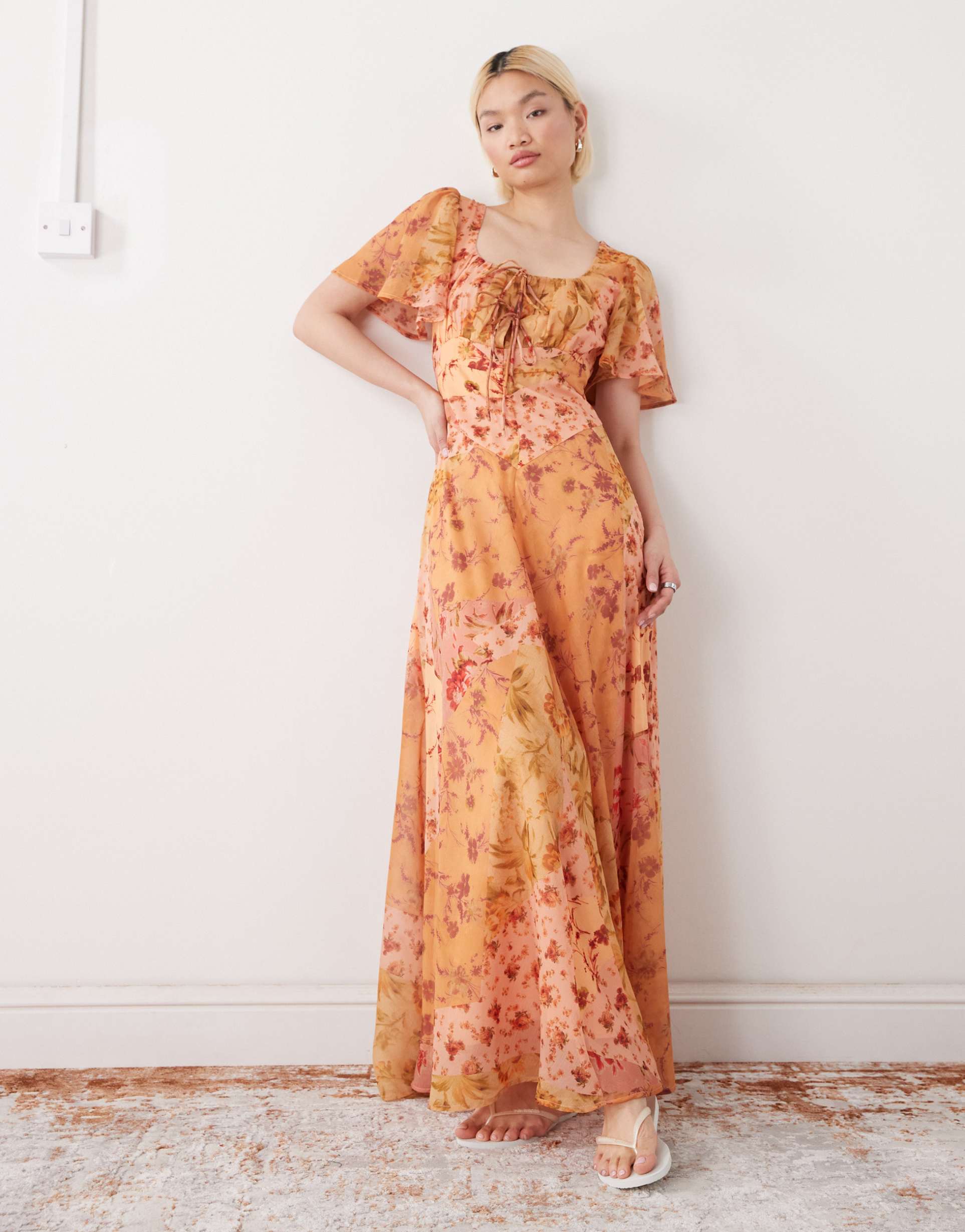 reclaimed vintage dressy maxi dress with double cape sleeves and godets in golden floral print