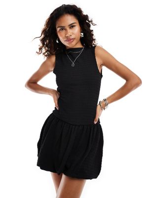 drop waist puffball mini dress in black