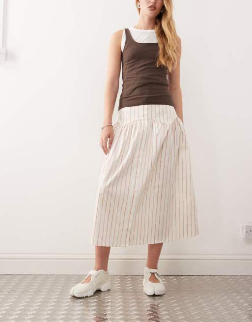 Reclaimed Vintage dropped waist midi skirt with buttons in red and white pinstripe