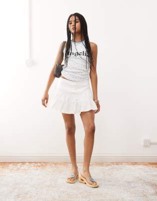Reclaimed Vintage dropped waist tiered ruffle skirt in ivory