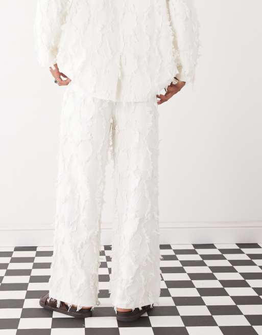 Reclaimed Vintage - Édition Limitée - Pantalon ajusté à détails effilochés - Crème, 4 de 5