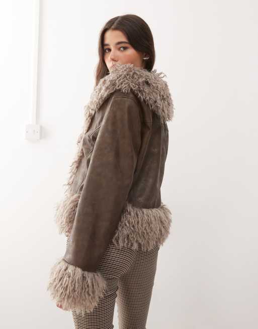 Reclaimed Vintage faux fur trim leather look short jacket in brown
