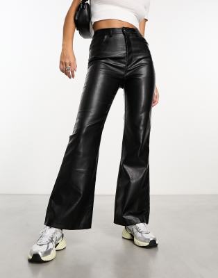 Reclaimed Vintage faux leather flare trouser in black | ASOS