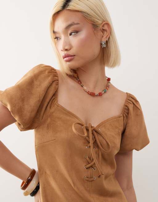 Reclaimed Vintage festival lace up faux suede mini dress in tan ASOS